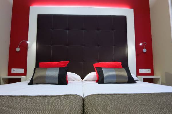Habitación doble con cama extra Hotel Boutique Catedral en Valladolid
